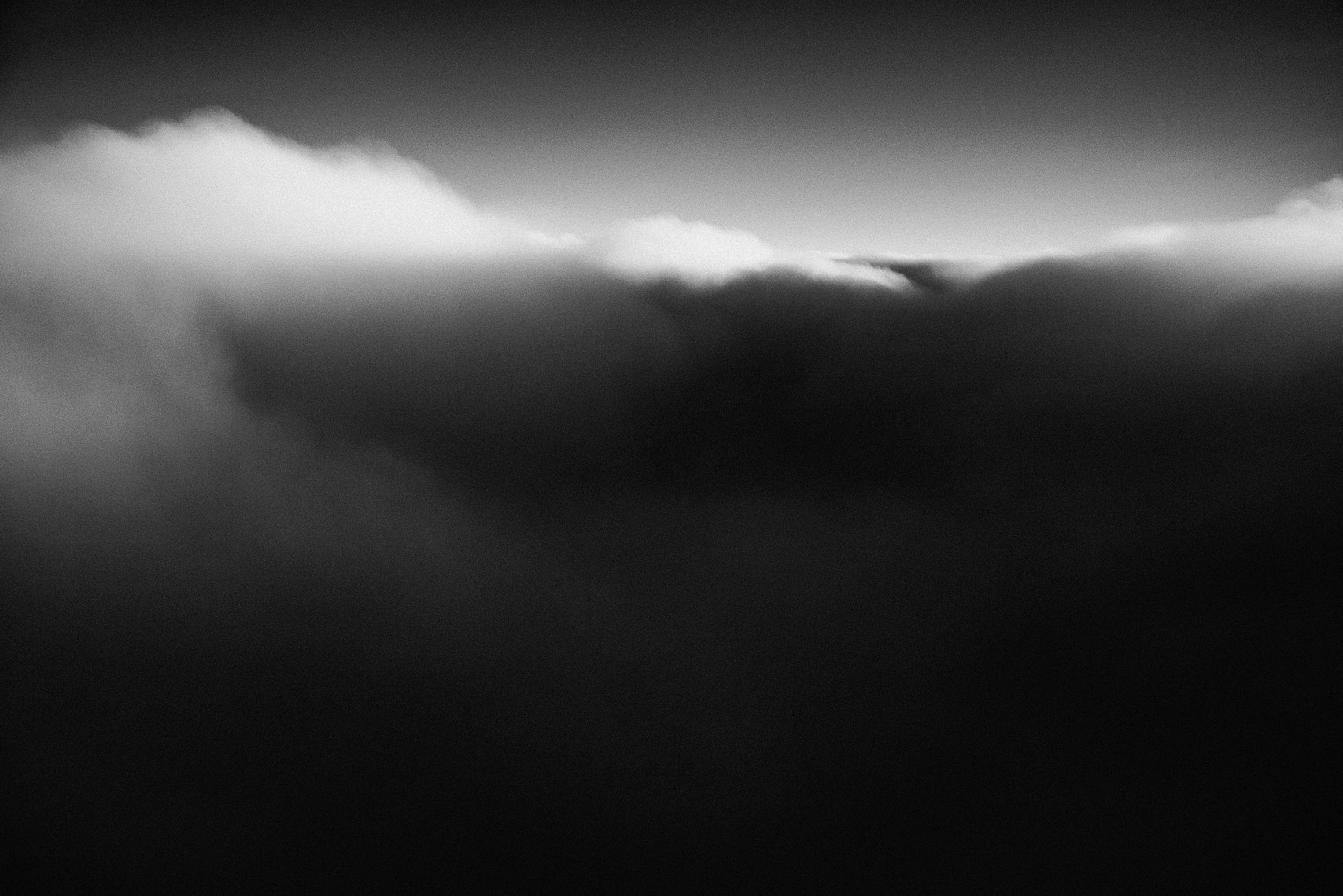 Clouds Full. Ground. Images of the personal interaction between travel and remaining still during my travels.