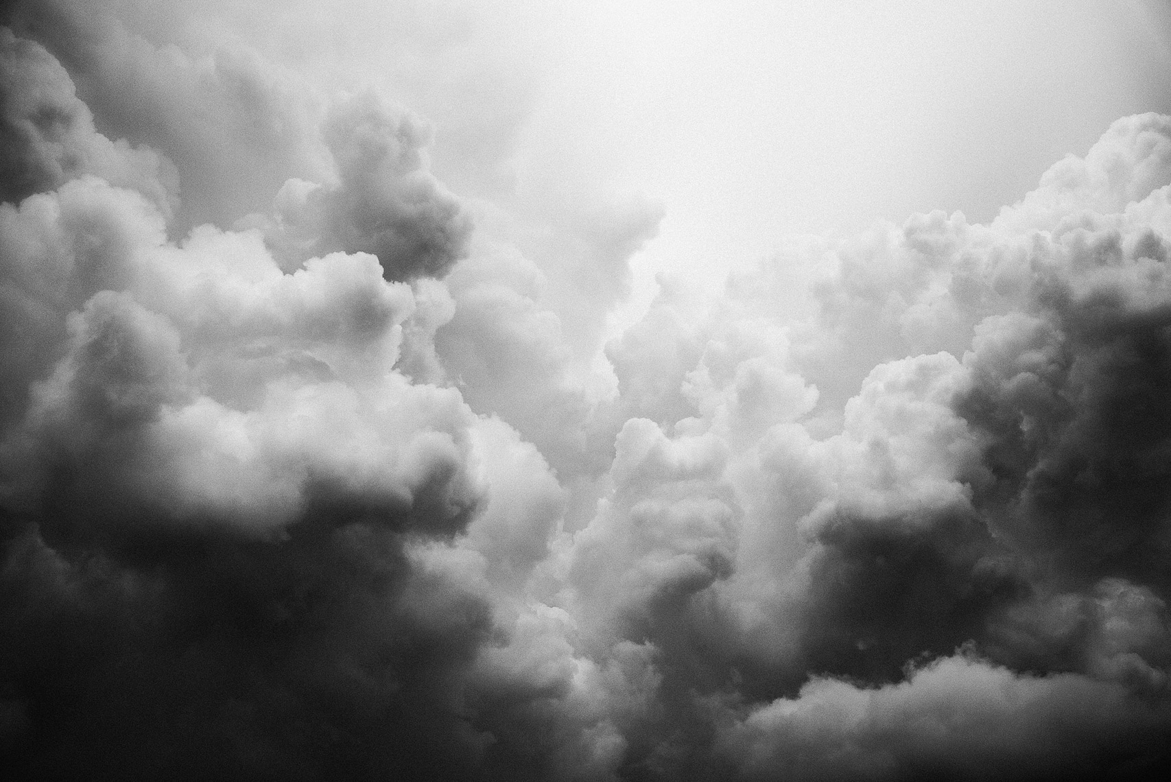 Clouds Full. Ground. Images of the personal interaction between travel and remaining still during my travels.