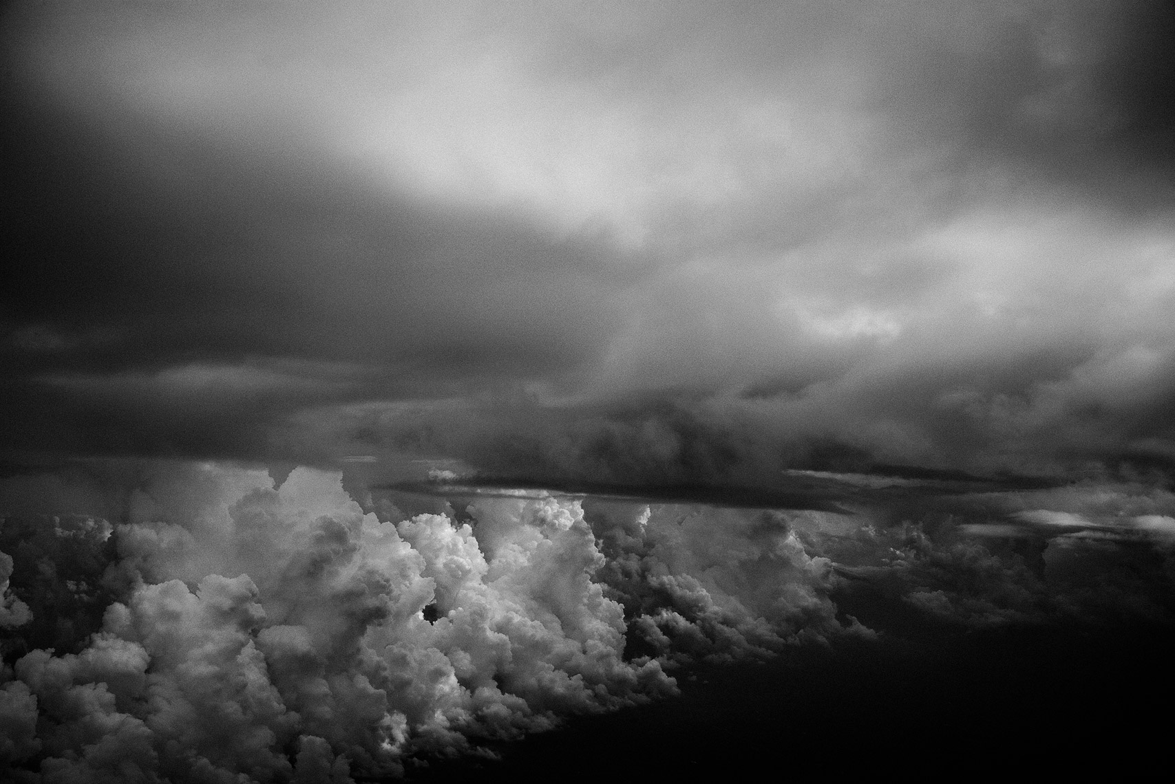 Clouds Full. Ground. Images of the personal interaction between travel and remaining still during my travels.